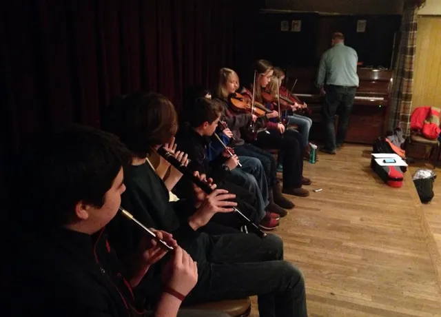 Students of the CCÉ Boston Music School playing together